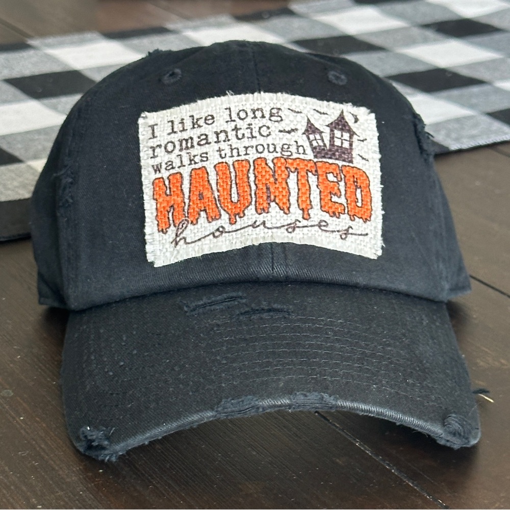 Black Patch Hat that says, I like long romantic walks through haunted houses.